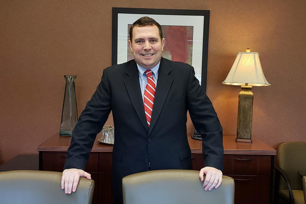Personal Injury Attorney George Angelopoulos in his office